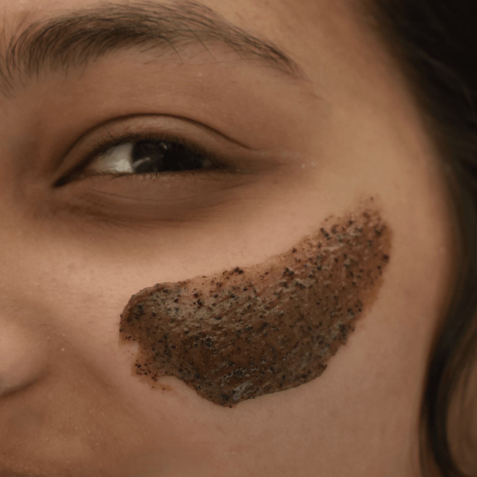 Rich, creamy texture of Mocha Face Scrub with visible exfoliating granules
